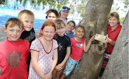 Howard State School children - (L) Jordan Mills, Ben Klein, Chloe Kennedy, Hayley Hampton, Tahlia Kindelan, Tyson Alen and Kynesha Stapleton with Rebecca Dudley from WBW and Bunnings Karen McKie - garden competition grand champions. Howard State School children - (L) Jordan Mills, Ben Klein, Chloe Kennedy, Hayley Hampton, Tahlia Kindelan, Tyson Alen and Kynesha Stapleton with Rebecca Dudley from WBW and Bunnings Karen McKie - garden competition grand champions.